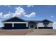 Modern two-story home with a two-car garage and landscaped yard at 4237 E 4Th Ave, Apache Junction, AZ 85119