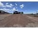 Modern home with two-car garage and a long driveway at 4237 E 4Th Ave, Apache Junction, AZ 85119