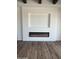 Modern linear fireplace with built-in entertainment niche at 4237 E 4Th Ave, Apache Junction, AZ 85119