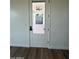 Glass door leading to a private outdoor patio area at 4237 E 4Th Ave, Apache Junction, AZ 85119
