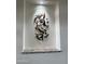 Abstract metal wall art above a granite shelf in a niche at 4237 E 4Th Ave, Apache Junction, AZ 85119