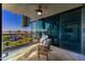Private balcony with city views and seating at 7120 E Kierland Blvd # 416, Scottsdale, AZ 85254