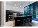 Modern community kitchen with stainless steel appliances and bar seating at 7120 E Kierland Blvd # 416, Scottsdale, AZ 85254