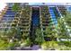 Modern apartment building with a landscaped courtyard entrance at 7120 E Kierland Blvd # 416, Scottsdale, AZ 85254