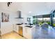 Modern kitchen with stainless steel appliances and island with seating at 7120 E Kierland Blvd # 416, Scottsdale, AZ 85254