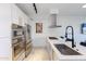 Modern kitchen with stainless steel appliances and an island at 7120 E Kierland Blvd # 416, Scottsdale, AZ 85254