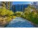 Linear water feature surrounded by lush landscaping and building view at 7120 E Kierland Blvd # 416, Scottsdale, AZ 85254