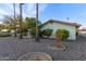 Exterior view of home with landscaping and trees at 931 Leisure World -- # 931, Mesa, AZ 85206