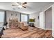 Relaxing bedroom with seating area and wood floors at 10439 W Cashman Dr, Peoria, AZ 85383