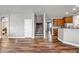 Wooden staircase with hardwood floors and neutral walls at 10439 W Cashman Dr, Peoria, AZ 85383