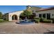 Elegant community clubhouse with a charming fountain at 12844 W El Sueno Dr, Sun City West, AZ 85375