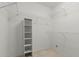 Spacious closet with wire shelving and a tall cabinet for storage at 14510 W White Rock Dr, Sun City West, AZ 85375