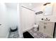Clean bathroom with patterned tile floor and modern vanity at 2143 W Wilshire Dr, Phoenix, AZ 85009