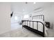 Main bedroom with a double bed and sitting area at 2143 W Wilshire Dr, Phoenix, AZ 85009