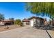 House exterior with a separate building and driveway at 430 W Hermosa Dr, Tempe, AZ 85282