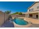 Freeform swimming pool with rock features at 5435 W Michigan Ave, Glendale, AZ 85308