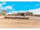 Single-story home with a neutral exterior, attached garage, and landscaping at 8155 N Pueblo Cir, Casa Grande, AZ 85194