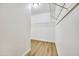 Spacious closet with wire shelving and wood-look flooring at 9273 W Sheridan St, Phoenix, AZ 85037