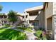 Attractive building exterior with lush landscaping at 9451 E Becker Ln # 2060, Scottsdale, AZ 85260