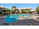 Inviting community pool and spa with surrounding patio at 9451 E Becker Ln # 2060, Scottsdale, AZ 85260