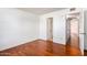 Bedroom with hardwood floors and bathroom access at 11640 N 51St Ave # 250, Glendale, AZ 85304