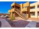 Apartment building entrance with stairs and landscaping at 11640 N 51St Ave # 250, Glendale, AZ 85304