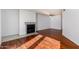 Living room with hardwood floors and fireplace at 11640 N 51St Ave # 250, Glendale, AZ 85304