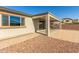 Covered patio with paver stones and a gravel yard at 17243 W Seldon Ln, Waddell, AZ 85355