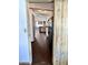 View of kitchen from hallway, featuring stainless steel appliances at 394 N Pinyon Dr, Apache Junction, AZ 85120