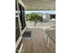 Covered patio with a view of a tree and neighboring homes at 7750 E Broadway Rd # 149, Mesa, AZ 85208