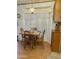 Cozy breakfast nook with bay window and wood table and chairs at 7750 E Broadway Rd # 149, Mesa, AZ 85208