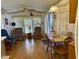 Small dining area with wood table and chairs, adjacent to living room at 7750 E Broadway Rd # 149, Mesa, AZ 85208