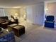 Spacious living room with comfortable seating and built in shelving at 7750 E Broadway Rd # 149, Mesa, AZ 85208