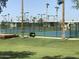 Well-maintained tennis courts with surrounding landscaping at 7750 E Broadway Rd # 149, Mesa, AZ 85208