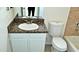 Clean bathroom with granite vanity and updated fixtures at 8621 W Altos Dr, Arizona City, AZ 85123