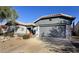 Single-story home with gray exterior and desert landscaping at 15352 W Via Manana --, Sun City West, AZ 85375