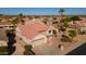 One-story home with tile roof and desert landscaping at 16316 W Willow Creek Ln, Surprise, AZ 85374