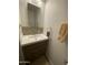 Small bathroom with updated vanity and fixtures at 2071 W Klamath Ave, Apache Junction, AZ 85119