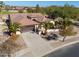 Single story home with attached two car garage and mature landscaping at 2596 E Desert Wind Dr, Casa Grande, AZ 85194
