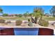 Landscaped backyard with golf course view and desert plants at 2596 E Desert Wind Dr, Casa Grande, AZ 85194