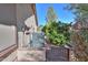 Air conditioning unit and side yard with mature citrus trees at 2596 E Desert Wind Dr, Casa Grande, AZ 85194