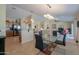 Kitchen and dining area with a breakfast bar and modern fixtures at 2596 E Desert Wind Dr, Casa Grande, AZ 85194
