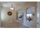 Elegant entryway with tile floors and views into the living areas at 2596 E Desert Wind Dr, Casa Grande, AZ 85194