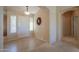 Bright entryway with tile floors and high ceilings at 2596 E Desert Wind Dr, Casa Grande, AZ 85194