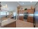 Spacious kitchen with stainless steel appliances and a large island at 2596 E Desert Wind Dr, Casa Grande, AZ 85194