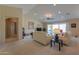 Relaxing living room with ample natural light and access to the backyard at 2596 E Desert Wind Dr, Casa Grande, AZ 85194