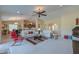 Open-concept living room showcasing a view of the kitchen and dining area at 2596 E Desert Wind Dr, Casa Grande, AZ 85194