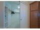 Spacious walk-in closet with shelving and hanging rods at 2596 E Desert Wind Dr, Casa Grande, AZ 85194