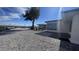 Landscaped backyard with gravel, pavers, and a large tree at 2809 E Frye Rd, Phoenix, AZ 85048