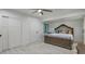 Bright bedroom with ceiling fan and large windows at 2809 E Frye Rd, Phoenix, AZ 85048